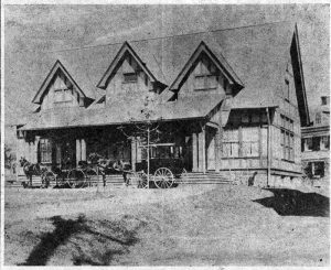 The Saturday Club House built in 1898-1899 as shown in this earliest picture, now in the possession of the Club. The two vehicles are those of club members who were probably enjoying a club program at the time. (Note the tall silk hat on the coachman in the front vehicle!)